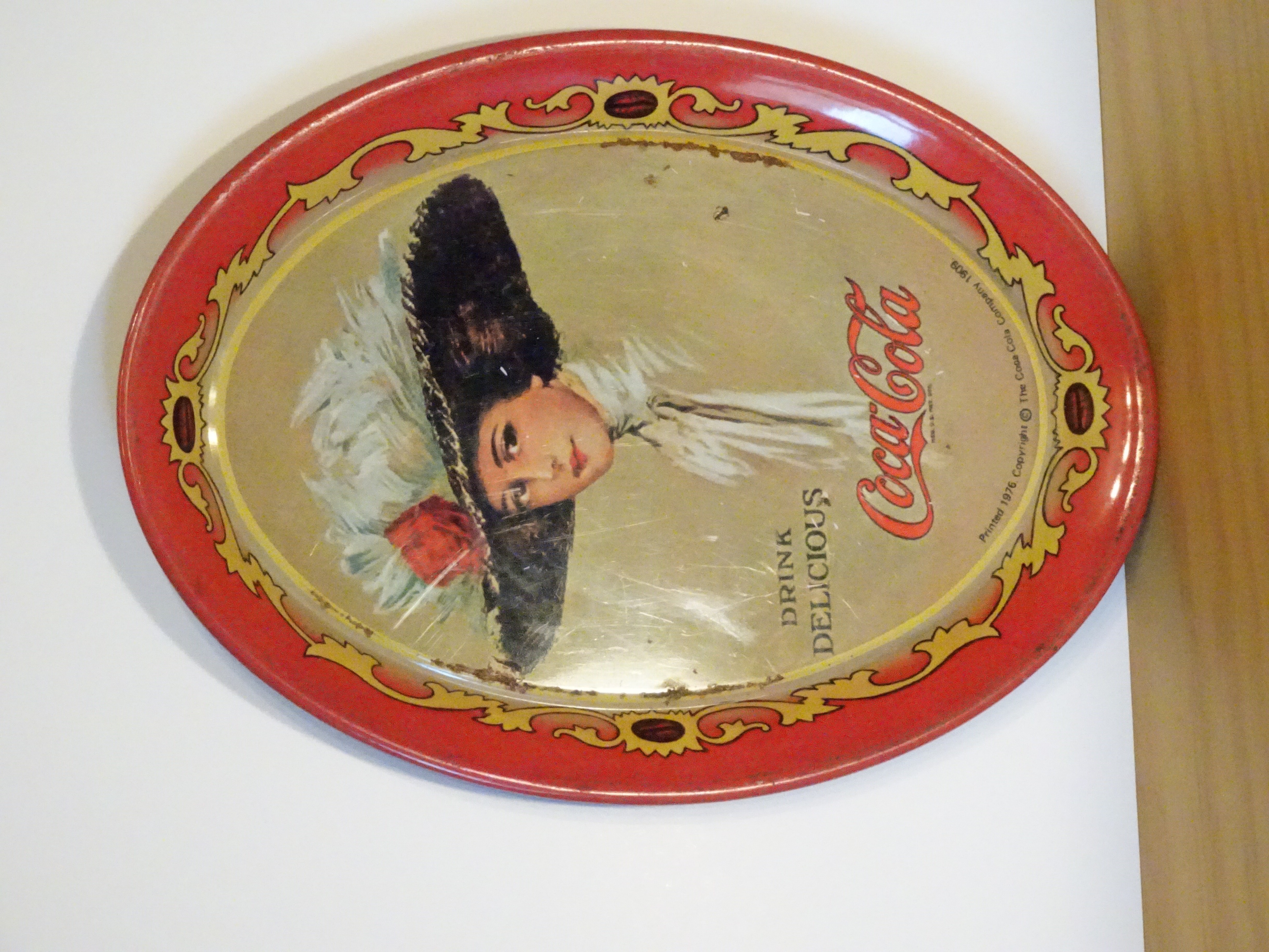 Tasse mit Coca Cola Werbung